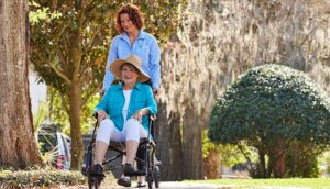 Caregiver Pushing Wheelchair
